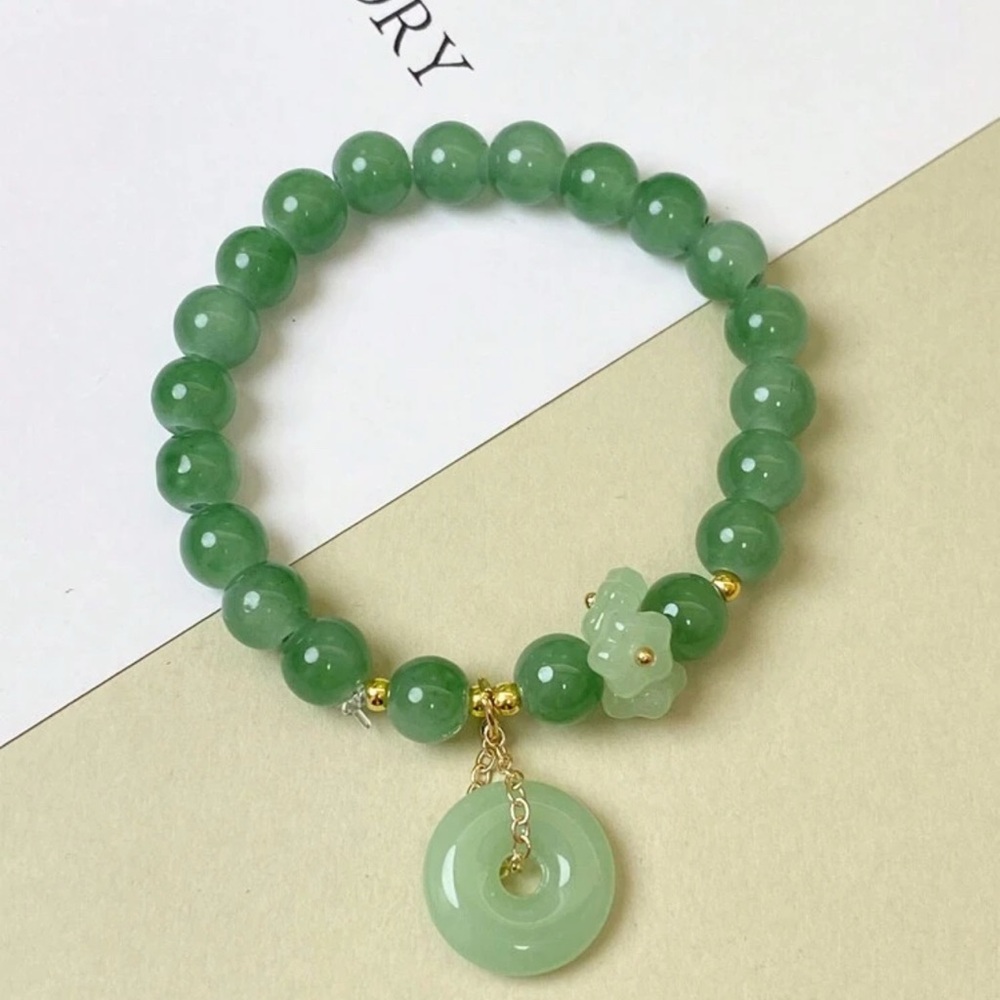 Elegant Gold and Green Bracelet